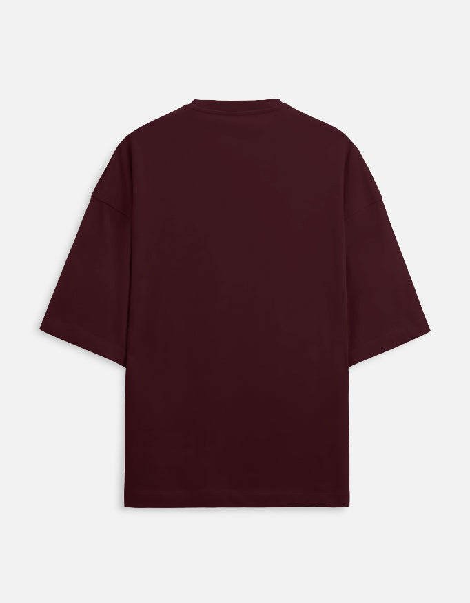 Unisex oversized terry tee in maroon, crew neck, plain back view.