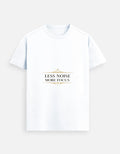 White unisex graphic tee with “LESS NOISE MORE FOCUS” text design on chest