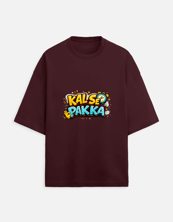 Unisex terry oversized tee, maroon, front “KAL’S E PAKKA” graphic print