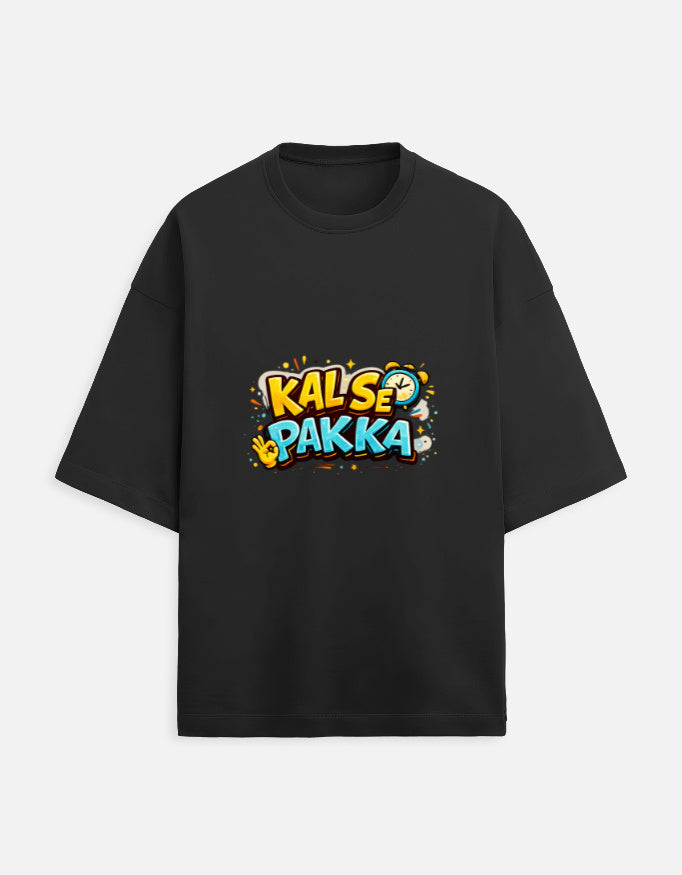 Unisex terry oversized tee, black, front “KAL’S E PAKKA” graphic print