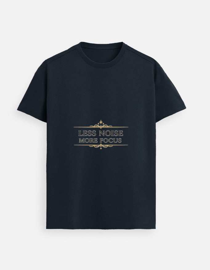 Navy blue unisex graphic tee with “LESS NOISE MORE FOCUS” text design on chest