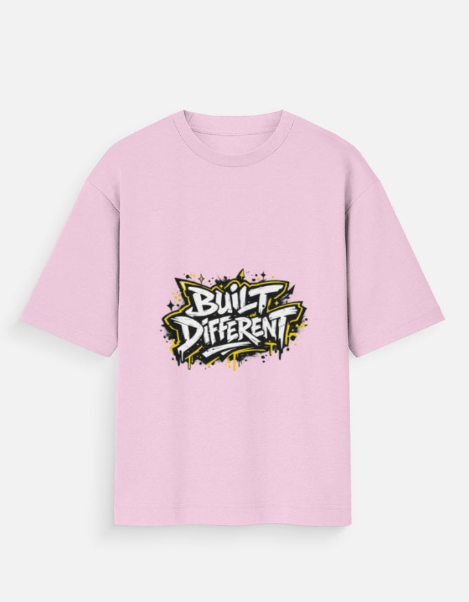 Oversized graphic tee, light pink crew neck, short sleeves, 'Built Different' logo front