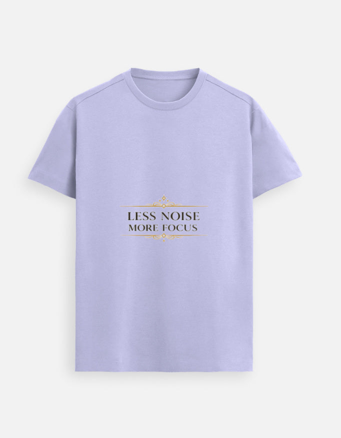 Lavender unisex graphic tee with “LESS NOISE MORE FOCUS” text design on chest