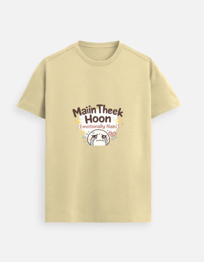 Beige crewneck T-shirt with front graphic text and cute character illustration.