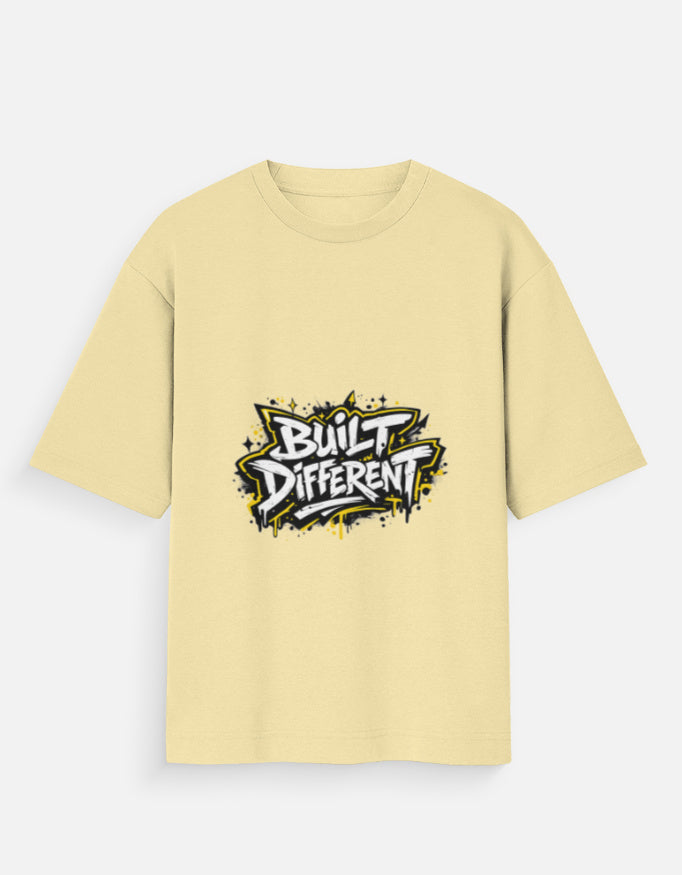 Oversized graphic tee, beige crew neck, short sleeves, 'Built Different' logo front