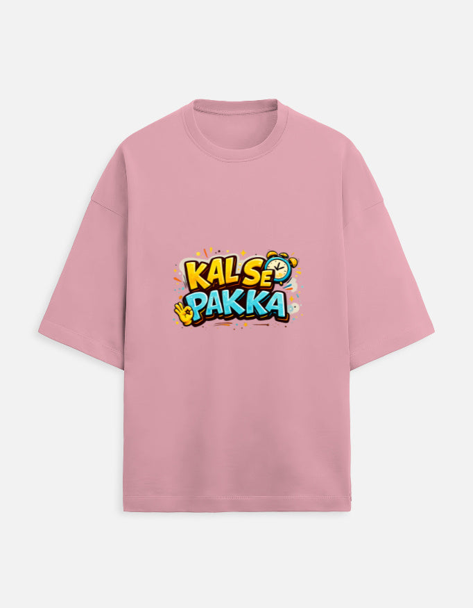 Unisex terry oversized tee, blush pink, front “KAL’S E PAKKA” graphic print