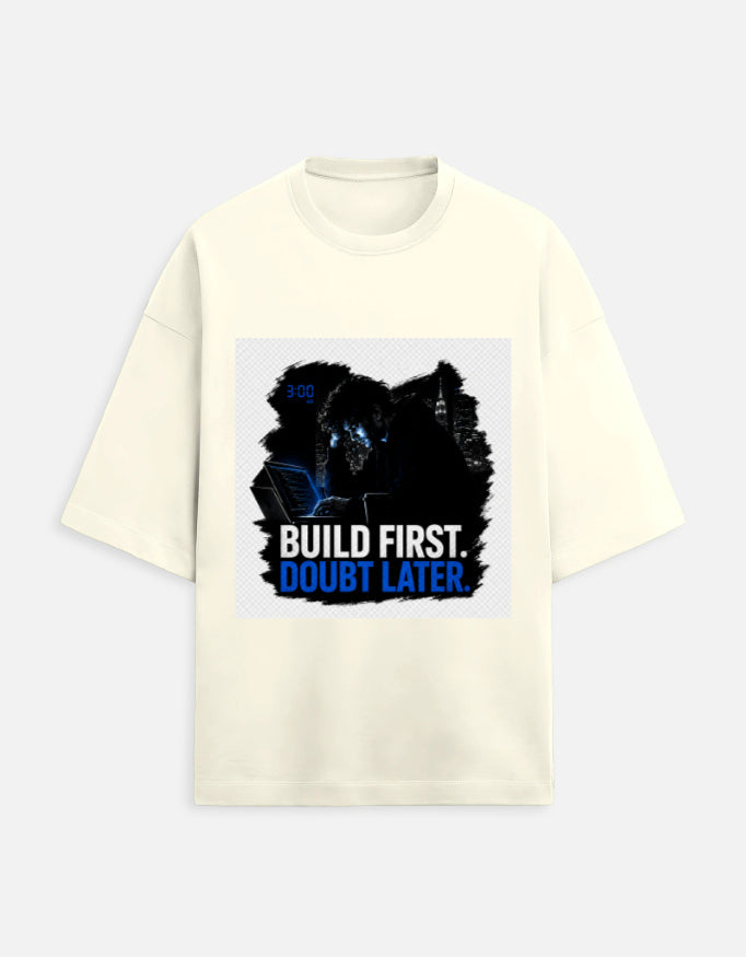Unisex oversized terry tee in off-white, crew neck, front graphic print.